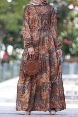 Autumn dress decorated with leaves